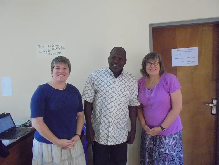 From right is Darcie, Rev, Sikabiya in the middle